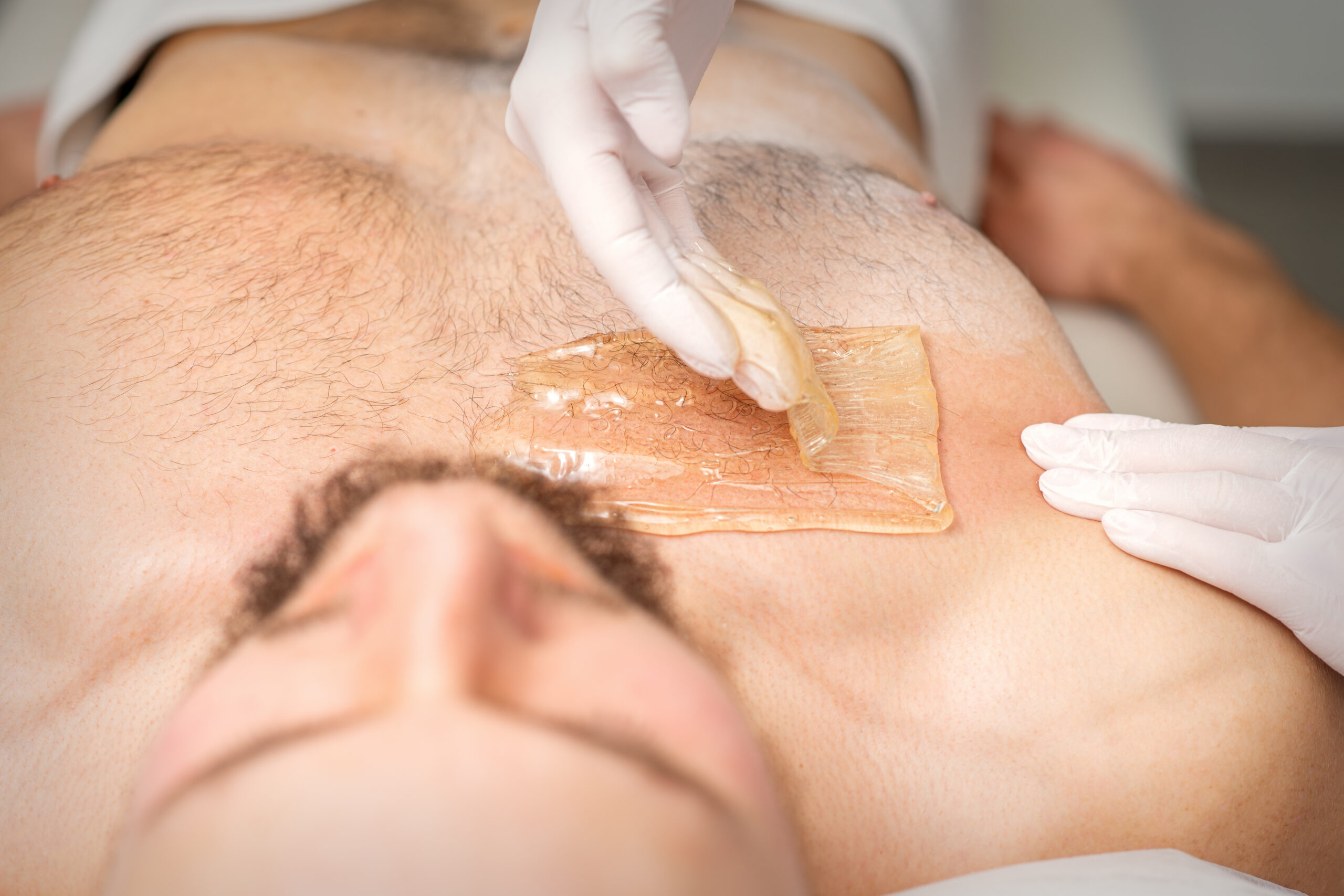 Man getting a chest wax